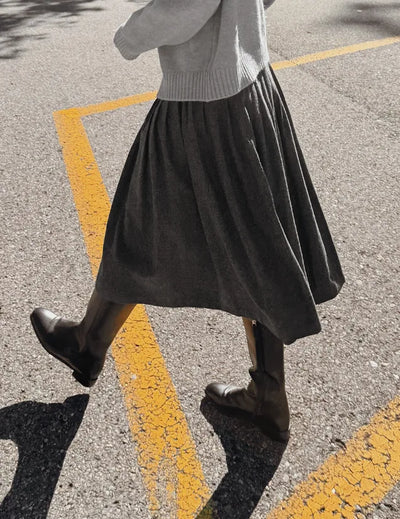 Pleated wool midi skirt