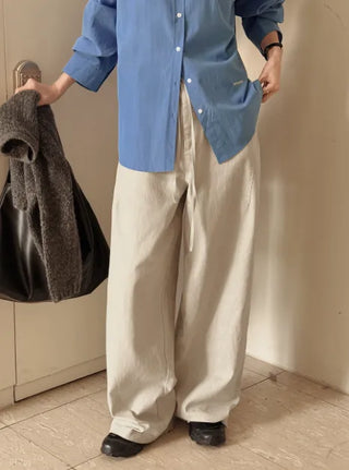 Curved wide-leg pants