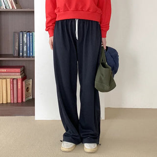 Line string elastic waist pants