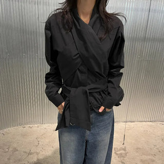 Round tie blouse