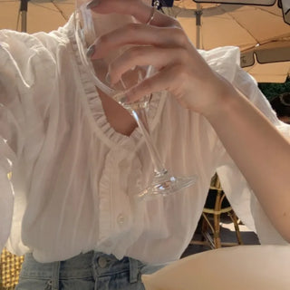 Autumn blouse with frills and pleats