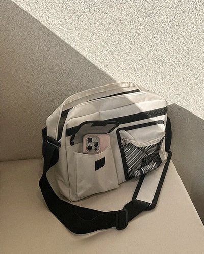 Canvas Mesh Zip-Up Pocket Messenger Bag