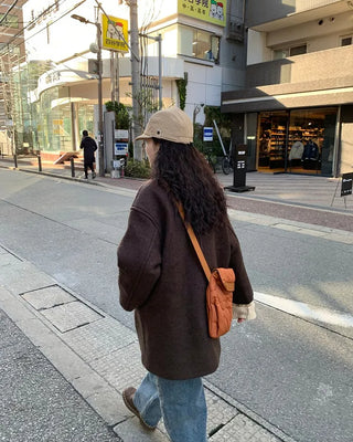 A half coat that can be worn even in the middle of winter.