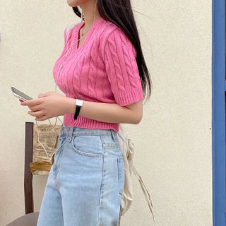 Semi-cropped V-neck pink cable twist puff knit