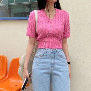 Semi-cropped V-neck pink cable twist puff knit
