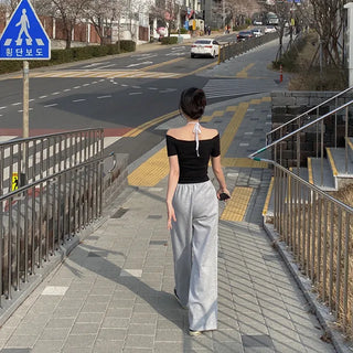 Off-shoulder semi-cropped black short-sleeved T-shirt