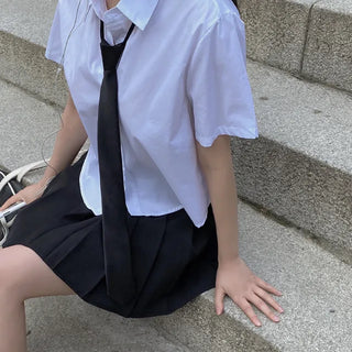 Cropped white loose-fit short-sleeve shirt