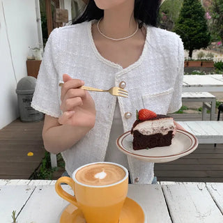 Cropped tweed collarless white jacket