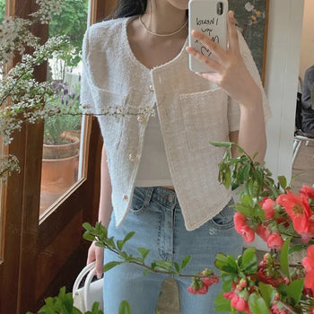 Cropped tweed collarless white jacket
