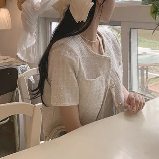 Cropped tweed collarless white jacket