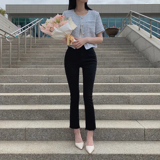 Cropped tweed collarless white jacket