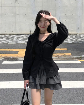Long-sleeved blouse with ribbon pleats and puff sleeves