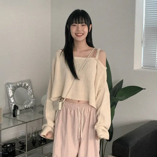 Asymmetrical boat neck cropped knit