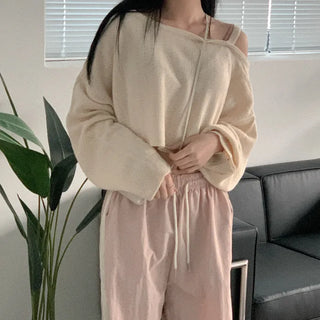 Asymmetrical boat neck cropped knit