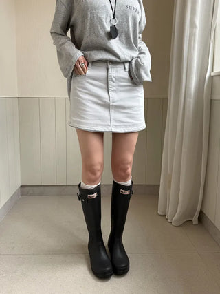 High-waisted ice blue denim mini skirt