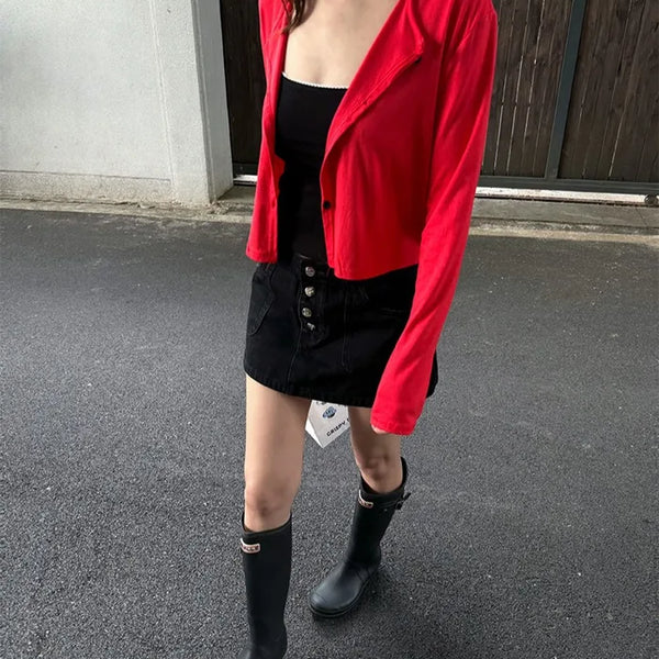 Black denim low-rise button mini skirt