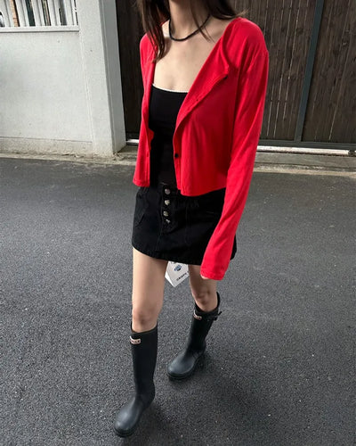 Black denim low-rise button mini skirt