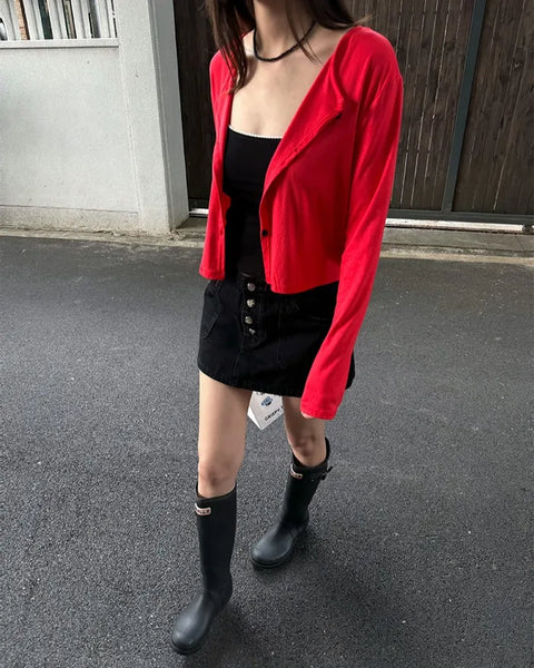Black denim low-rise button mini skirt