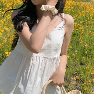 White flared sleeveless bustier blouse