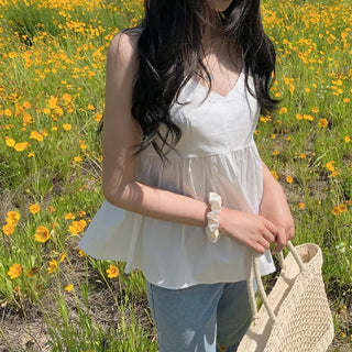 White flared sleeveless bustier blouse