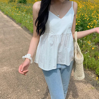 White flared sleeveless bustier blouse