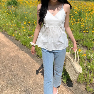 White flared sleeveless bustier blouse