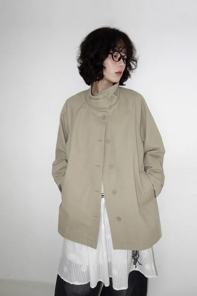 Cape-style half trench coat