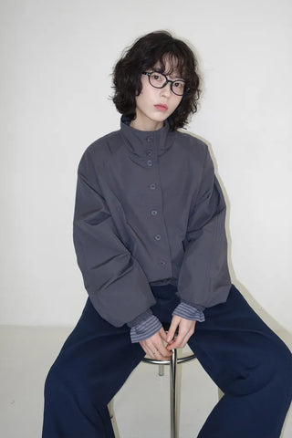 High-neck windbreaker with buttons