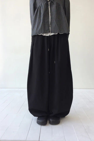 Wide-leg pants with balloon pleats