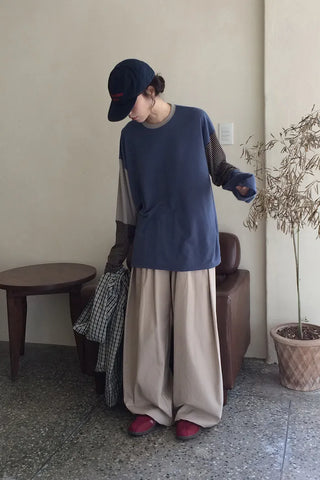 Wide-leg pants with balloon pleats