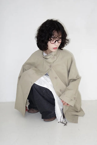 Cape-style half trench coat