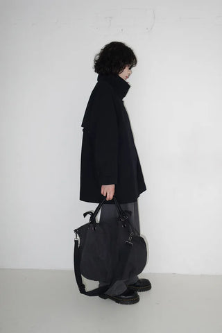 Cape-style half trench coat