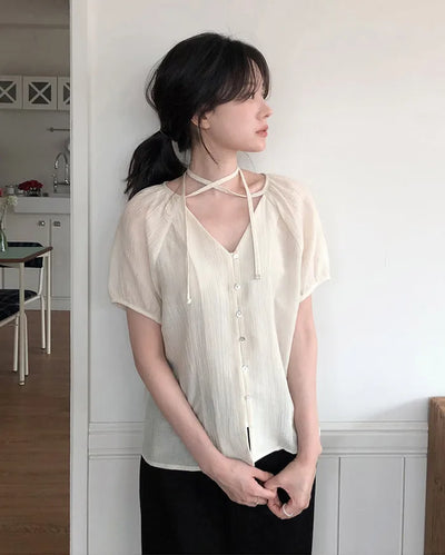Strappy short-sleeved blouse