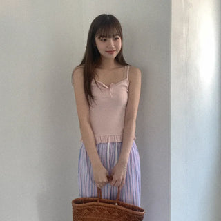 Frilled button sleeveless