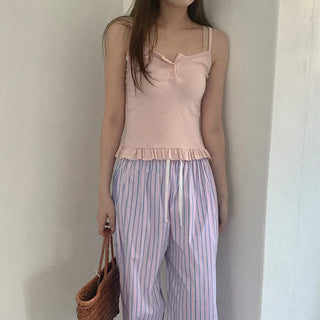 Frilled button sleeveless
