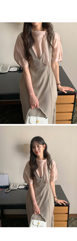 Short-sleeved blouse with puff tie
