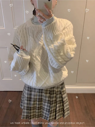 Loose-fit wool twist cable knit sweater