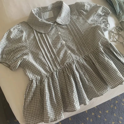Checkered color frill short-sleeved blouse