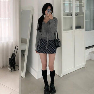 Round knit cardigan with ribbon