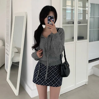 Round knit cardigan with ribbon
