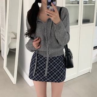 Round knit cardigan with ribbon