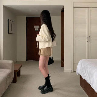 Scarf-lined, collarless, short V-neck jacket