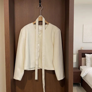Scarf-lined, collarless, short V-neck jacket