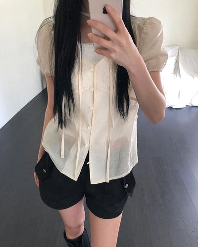 Back ribbon puff blouse