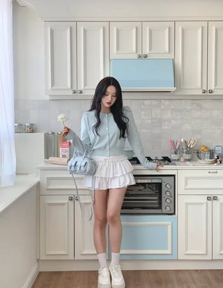 Round knit cardigan