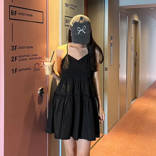 Black sleeveless mini dress