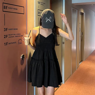 Black sleeveless mini dress