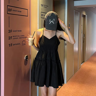 Black sleeveless mini dress