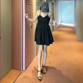 Black sleeveless mini dress
