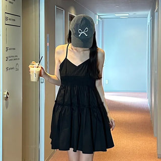 Black sleeveless mini dress